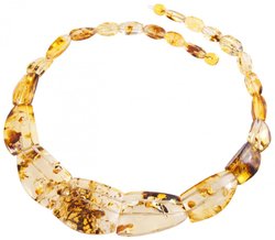 Beads made of figured translucent amber stones