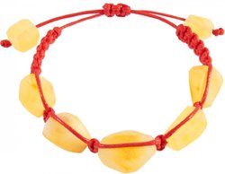 Amulet bracelet with red thread and light polished amber