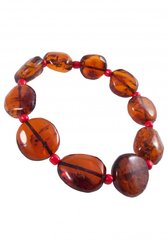 Bracelet made of amber stones-coins with beads