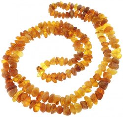 Long beads made of polished amber (medicinal)