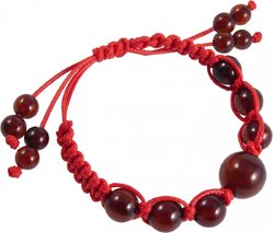 Amulet bracelet with red thread and dark amber balls
