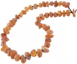 Beads-stones made of polished amber through a knot (medicinal)