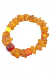 Amber bracelet with decorative inserts made of Indian ceramics