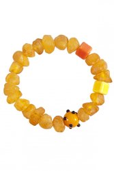 Amber bracelet with decorative inserts