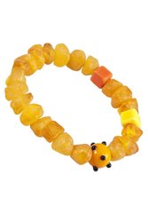 Amber bracelet with decorative inserts