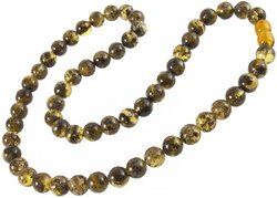 Beads made from greenish amber beads