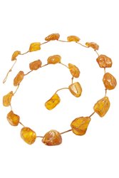 Beads-string made of honey-colored amber stones