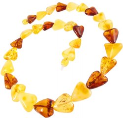 Beads made of amber stones in the shape of a heart