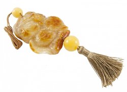 Pendant “Owl” on a wax rope with a tassel