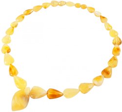 Beads made of light amber “Sun drops”