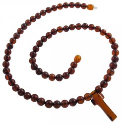 Beads made of amber balls with a cross