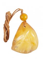 Pendant with relief stone and amber ball