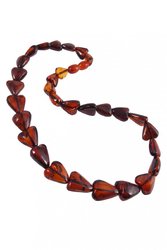 Beads made of dark amber stones in the shape of a heart