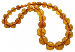 Beads-balls made of light amber