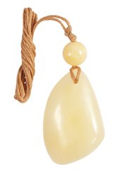 Stone pendant with amber ball