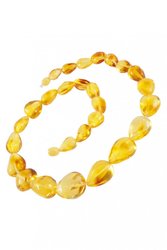 Beads made of light translucent amber “Katrin”