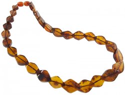 Beads made of figured amber stones