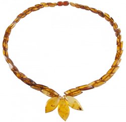 Amber beads made of figured stones