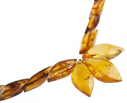 Amber beads made of figured stones