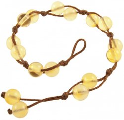 Bracelet made of amber balls on a rope