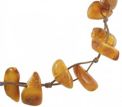 Amber bracelet on waxed thread