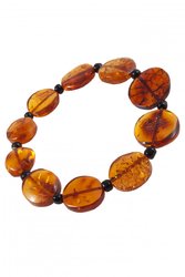 Bracelet made of amber stones in the shape of coins