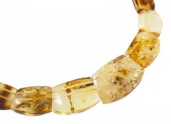 Beads made of figured amber stones