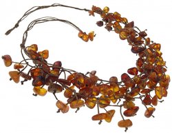 Amber beads made of stones on waxed thread