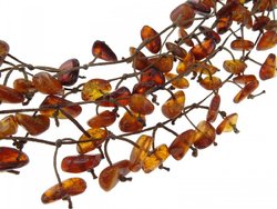 Amber beads made of stones on waxed thread