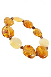 Bracelet made of amber stones and coins