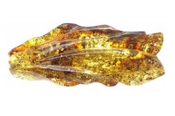 Solid amber brooch