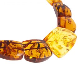 Amber beads made of figured stones