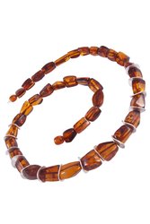 Beads with amber and decorative elements