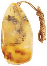 Pendant made of honey amber on a waxed rope