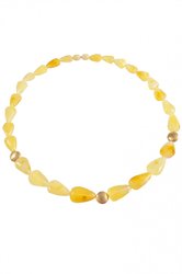 Light beads with amber and decorative elements