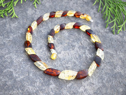 Beads with a combination of light and dark amber “Amber leaves”