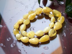 Beads made of large amber drop stones “Esthete”