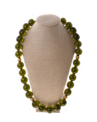 A necklace of greenish amber balls