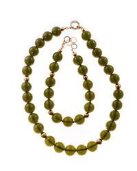 A necklace of greenish amber balls