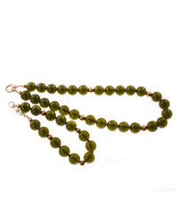 A necklace of greenish amber balls