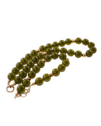 A necklace of greenish amber balls