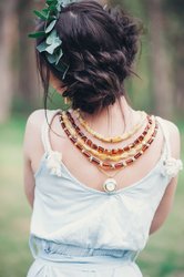 Amber beads with decorative inserts