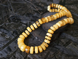 Beads made from amber donut stones “Triumph”