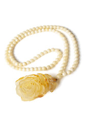 Beads made of amber balls with a “Rose” pendant