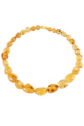 Beads made of light amber stones “Crumpled Cherry”