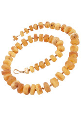 Polished amber beads