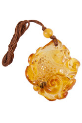 Carved amber pendant “Fish”