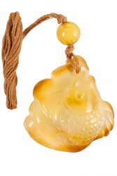 Pendant carved from amber stone “Fish”