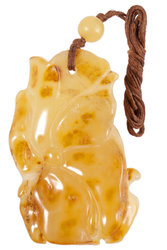 Carved amber pendant “Fish”