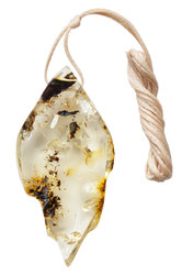 Pendant made of polished light amber stone